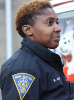 New Haven, Connecticut, officer Monique Moore, used department computers for harassment purposes