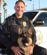Brentwood, California, officer Ryan Rezentes & his white dog Marco