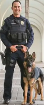 Brentwood, California, officer Ryan Rezentes & his white dog Marco